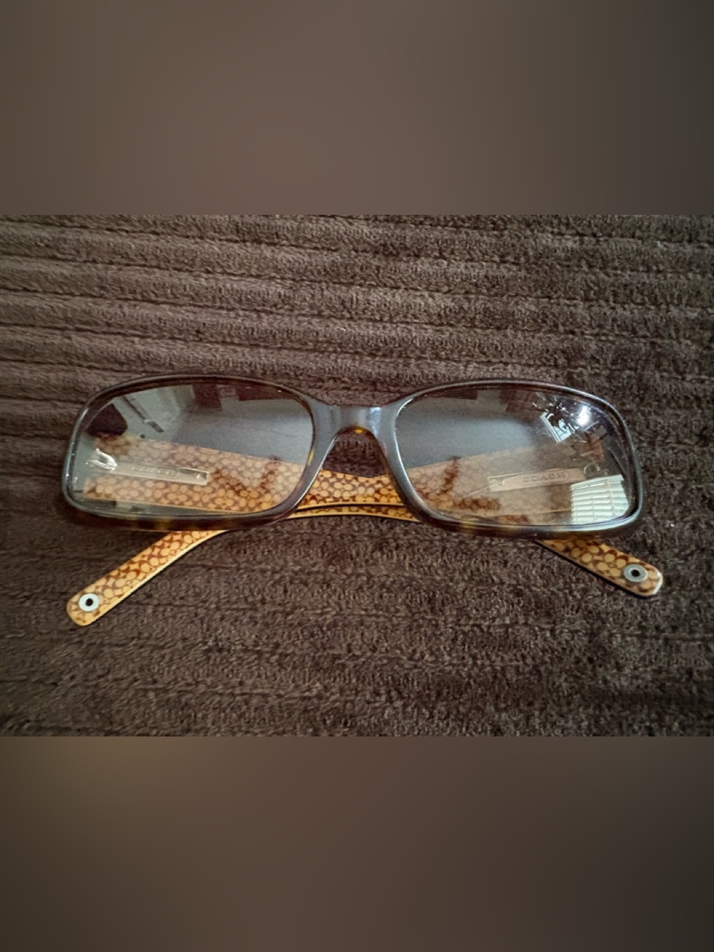 Coach Women's Sunglasses - Tortoise Brown Frame with Honey Pattern.